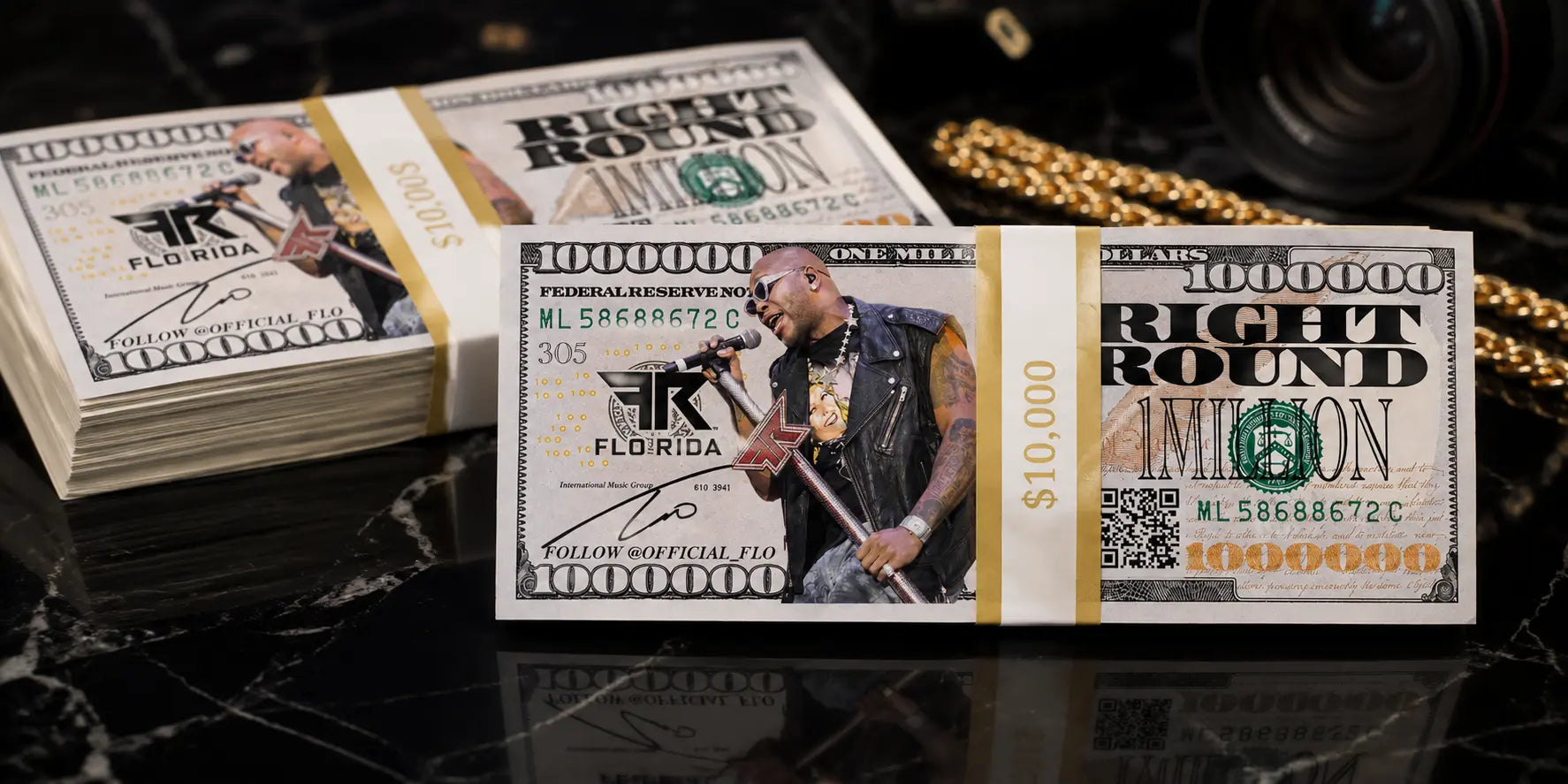 Custom Flo Rida million dollar prop money stacks produced by Prop Money Inc. for entertainment and media productions.
