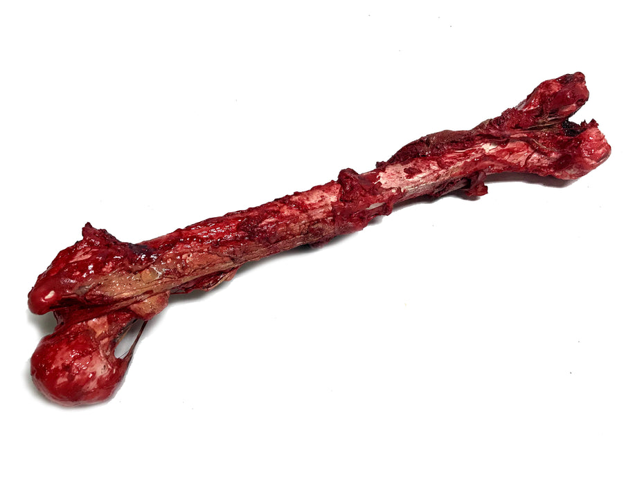 Bloody, Grisly Femur Bone Special Effects Prop with Realistic Skin and Gore - Prop Money Inc.